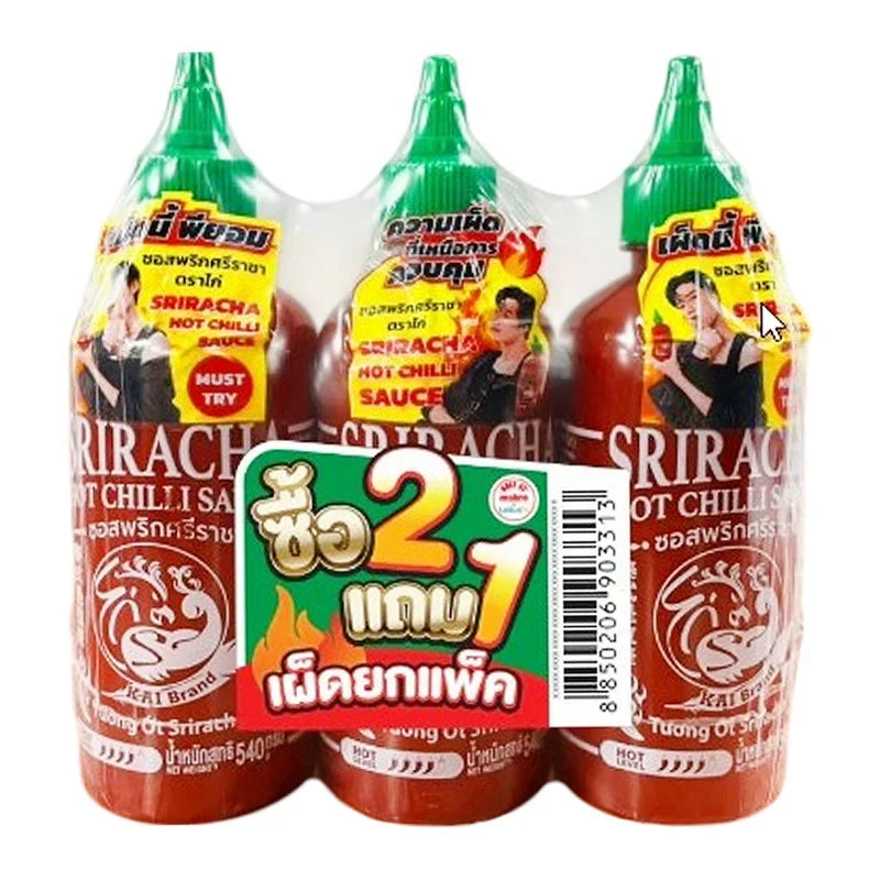 KAI Brand Sriracha Hot Chilli Sauce 540g, shown in the bottle with vibrant red chili sauce, ideal for spicy dishes.
