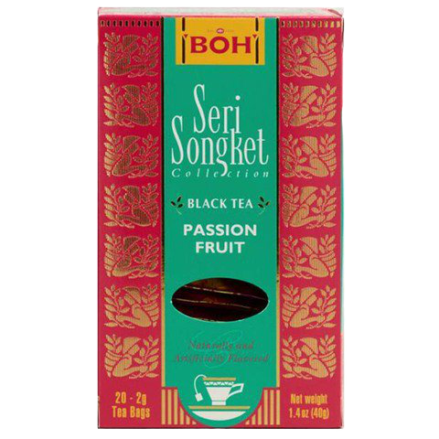 Boh Seri Songket Passion Fruit Tea drink in a clear glass, showing vibrant passion fruit flavor and rich tea color.