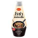 Roza Black Pepper Sauce bottle from grocery aisle, dark sauce with black pepper bits in clear glass bottle.