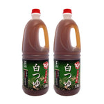 Futaba Dashi Shiro Tsuyu Bonito Sauce with white soy bottles, traditional Japanese dry grocery condiment for soups and marinades.