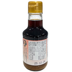 Tamago brand Tamago Ni Kakeru Shoyu Mentaiko Iri, Japanese grocery condiment with soy sauce and spicy cod roe, in a jar.
