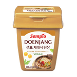 Jar of Sempio soybean paste in a grocery setting, showcasing the traditional Korean fermented soybean paste product.