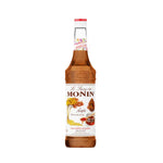 Bottle of MONIN Maple Syrup 700ml for dry grocery, with amber-colored syrup in clear plastic bottle and label.