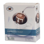 D'Oro Drip Coffee Espresso drink in a clear glass cup with dark coffee and a splash of cream on top.