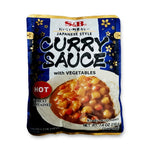 S&B Hot Curry Sauce 210g jar with spicy curry sauce visible inside, labeled in Japanese, placed on a neutral background