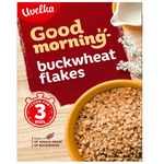 Uvelka Buckwheat Flakes in a clear bowl, showing roasted, golden-brown buckwheat cereal for healthy breakfast or cooking.
