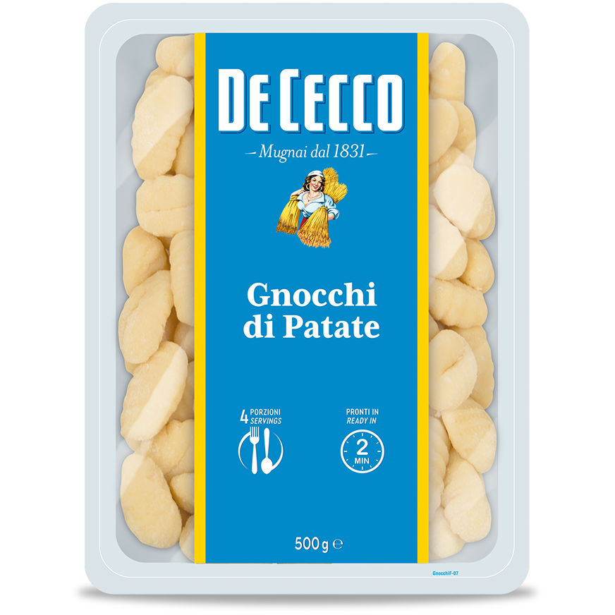 De Cecco Gnocchi di Patate, Italian potato gnocchi pasta, served in a bowl with sauce and fresh herbs.