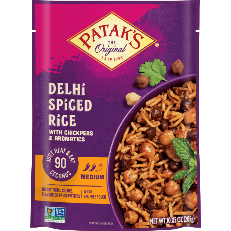 Patak's Delhi Spiced Rice in a bowl, showcasing the flavorful, seasoned rice with visible spices and herbs.