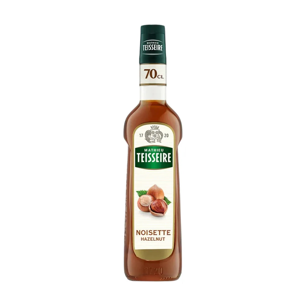 Mathieu Teisseire Hazelnut Syrup in a 700ml bottle, ideal for flavoring beverages and desserts, from the dry grocery collection.