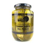 Jar of The Serial Pickler Classic Garlic Dill Pickles with fresh dill and garlic inside the glass jar.