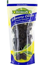 Canned Feinkost Dittmann Schwarze Olives in a glass jar, showcasing shiny black olives with a silver lid on a white background.