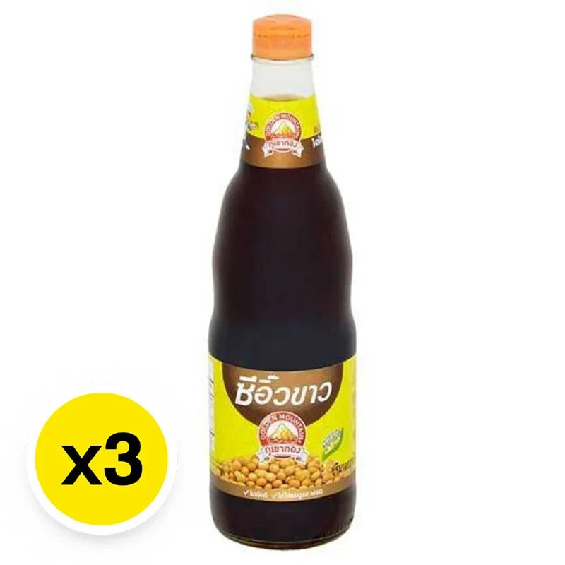 Golden Mountain soy sauce bottles, 600ml each, from GOLDEN MOUNTAIN, placed together in a dry grocery setting.