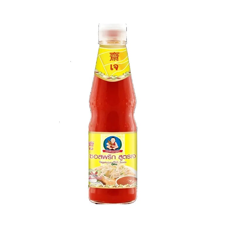 Deksomboon Vegetarian Chili Sauce 360g bottle shown, ideal for dry grocery, with a label featuring chili peppers and branding.