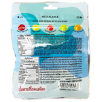 Colorful Skittles Gummy Yogurt Fruit candies in a clear bowl, showcasing vibrant, fruit-shaped confectionery snacks by Skittles.