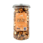 Choui Fong Thai tea popcorn snack in a bowl, showcasing crispy popcorn coated with Thai tea flavor.