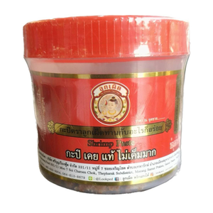 Mar Supen Shrimp Paste (Kapi) in a jar, used in cooking, with a close-up view of the product label and paste inside.