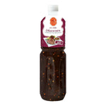 J-LEK Grilled Food Dipping Sauce in 1180g jar, popular dry grocery condiment for enhancing grilled dishes, shown in a clear container.