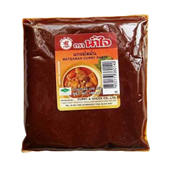 Nam Jai Matsaman curry paste jar, fragrant Thai grocery product with rich, aromatic spice blend for cooking flavorful Matsaman curry.