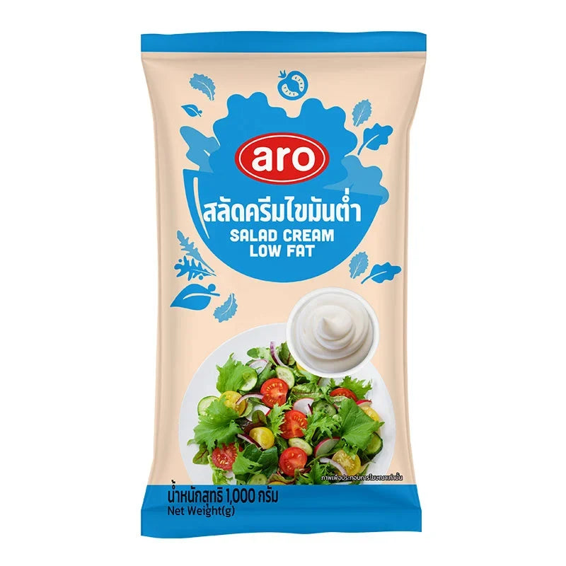 A 1kg bottle of ARO low-fat salad cream in a clear plastic container, showing the label and product packaging.