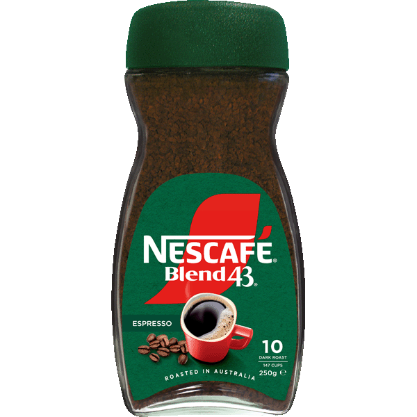 A cup of Nescafe Espresso coffee drink with a rich, dark appearance in a clear glass mug on a neutral background.