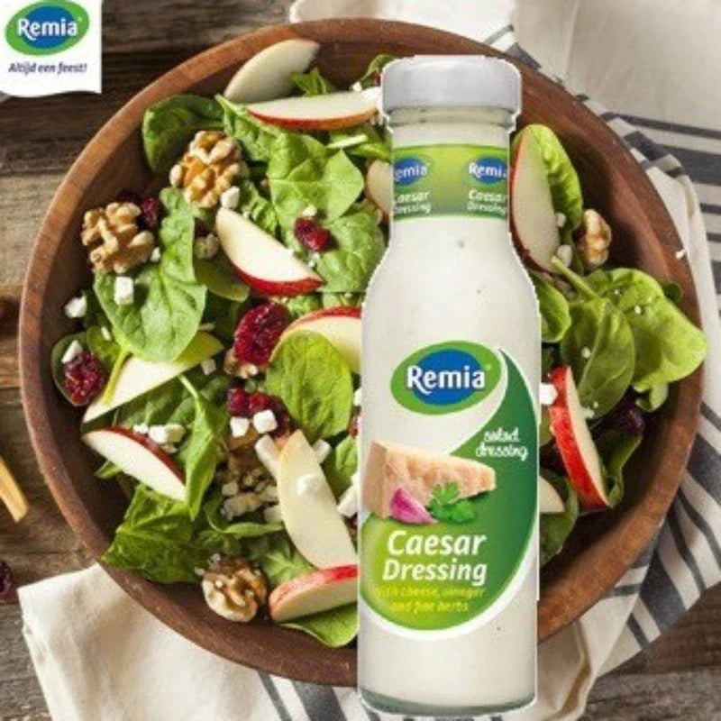 Remia Caesar Salad Dressing 250ml bottle, dry grocery product with creamy texture and classic Caesar flavor.