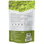 Choui Fong Green Tea Powder drink in a clear glass, showing vibrant green tea liquid with frothy top, close-up shot.