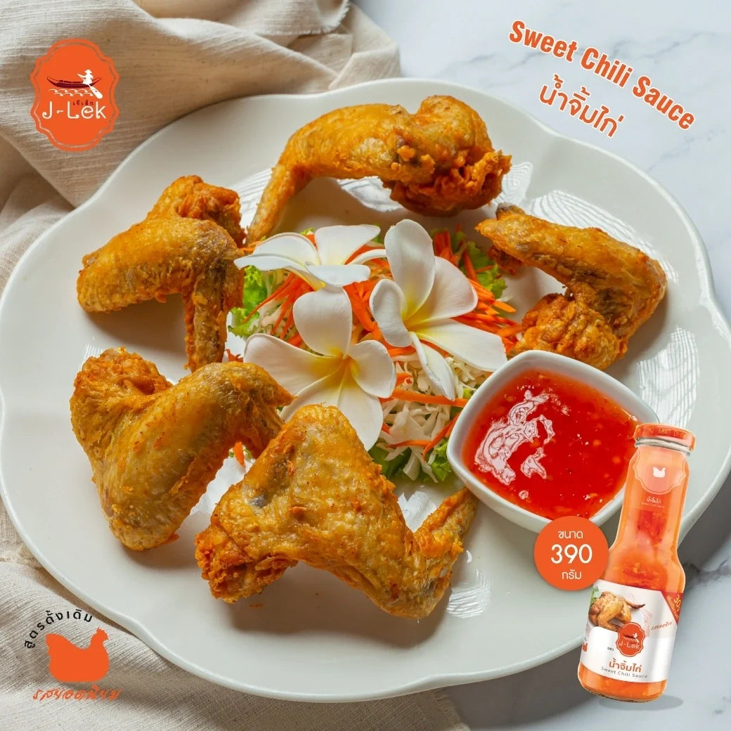 J-LEK Jae Lek Chicken Sauce in a 390g glass bottle, showcasing the clear bottle filled with rich chicken sauce for dry grocery use.
