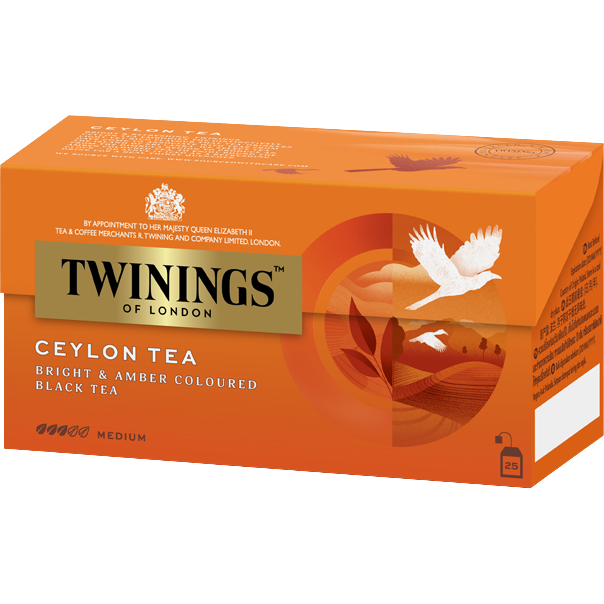 A cup of Twinings Finest Ceylon Tea in a white mug, showcasing the rich amber color of the brewed tea.