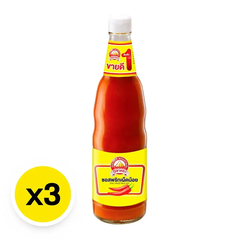 Golden Mountain Chili Sauce 680g bottle from Golden Mountain, featuring vibrant red chili peppers and Asian-style sauce in a clear bottle.