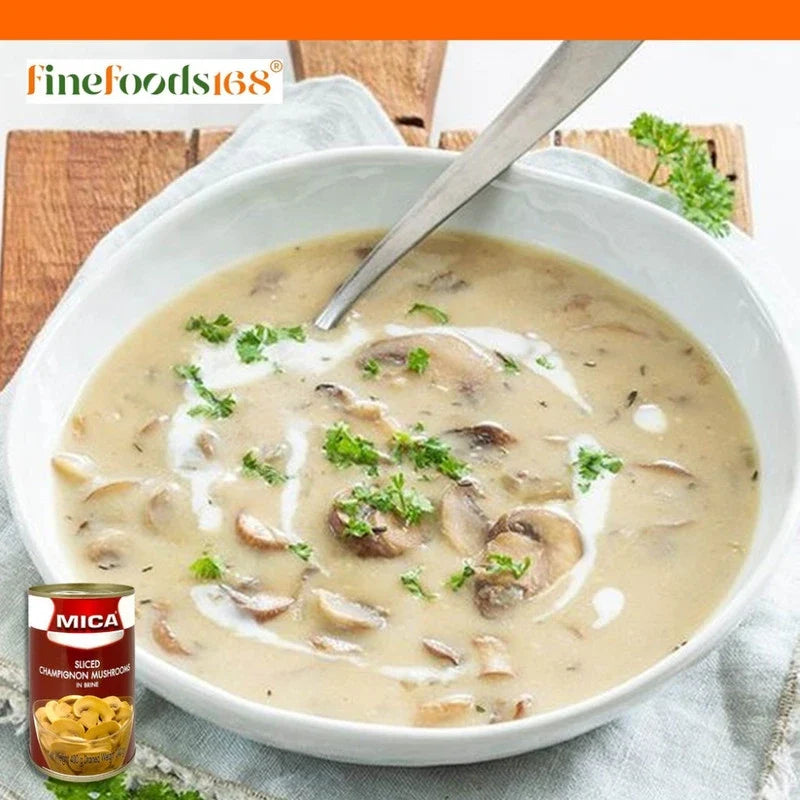 Canned MICA sliced champignon mushrooms in brine, 400g jar, showing glossy mushroom slices in clear liquid.