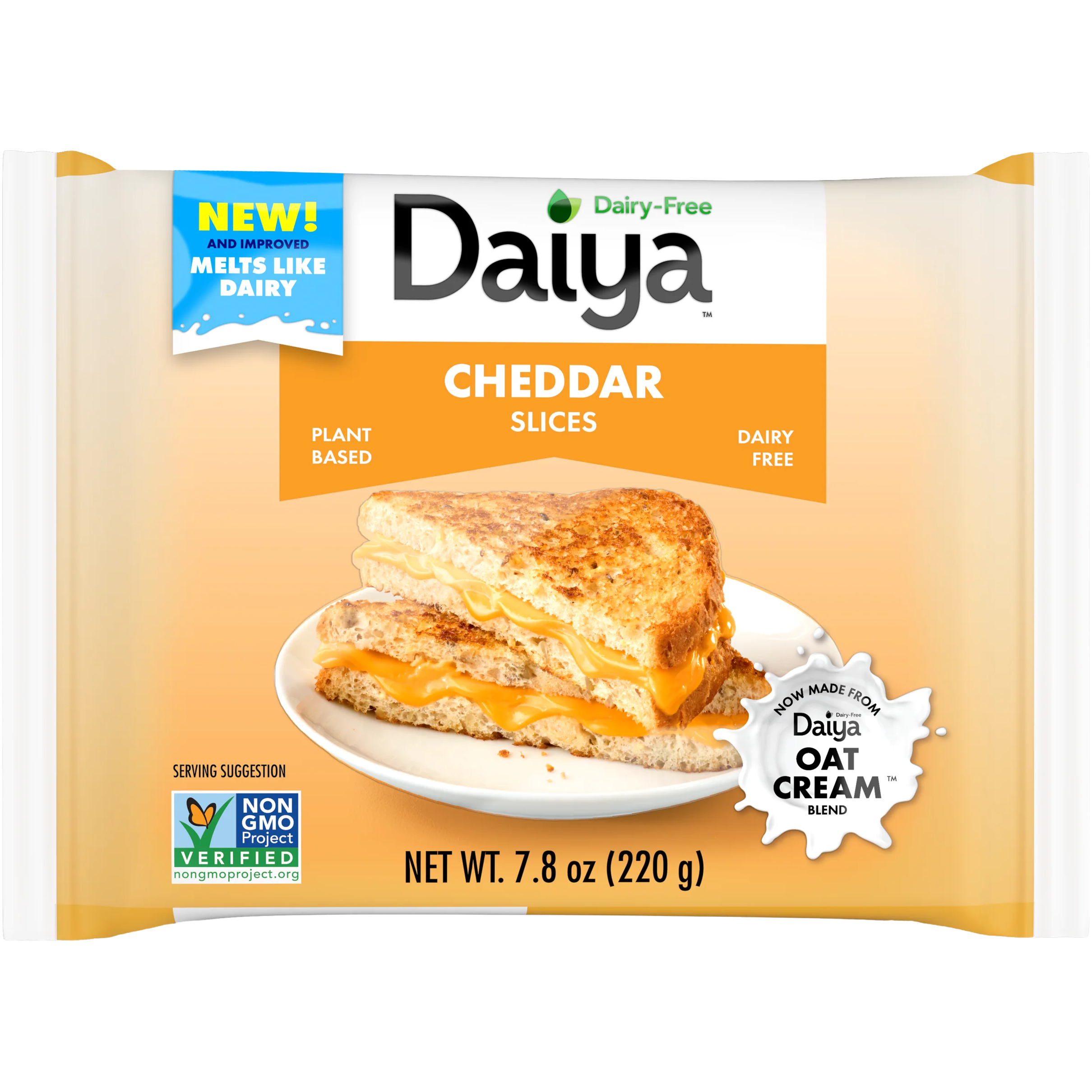 Sliced Daiya Vegan Cheddar Cheese on a plate, showcasing its vibrant orange color and smooth texture.