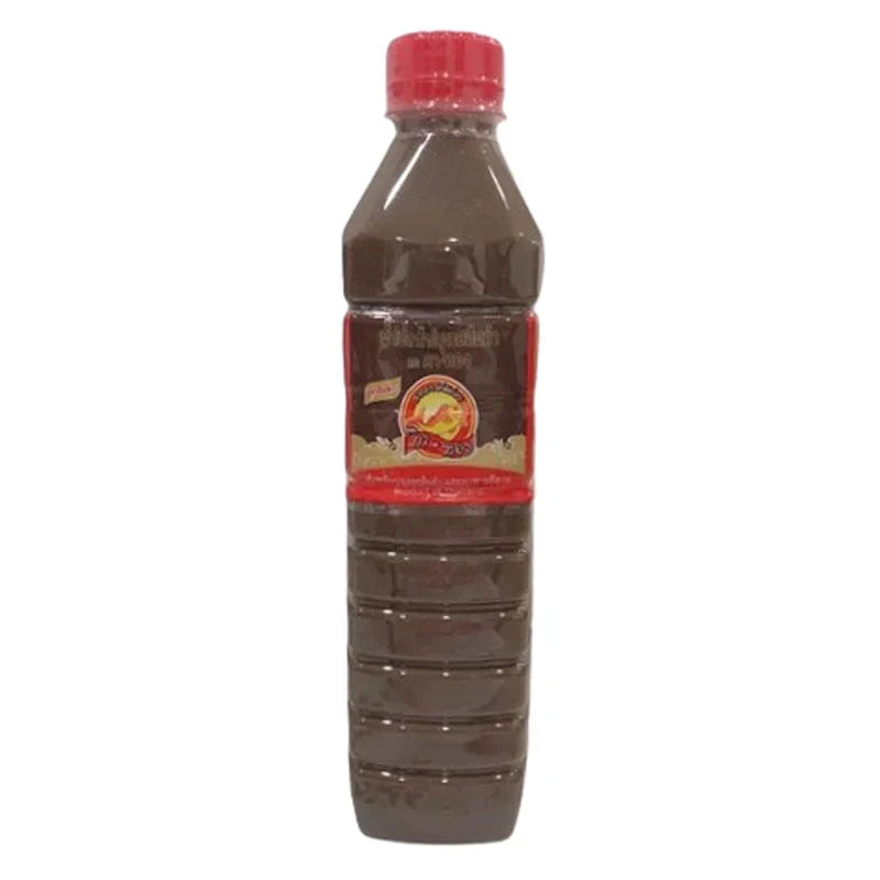 Pa-thong Patong fermented fish sauce in a 500ml bottle, used in Thai cuisine, with clear label and dark liquid inside.