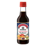 Bottle of Kikkoman Sushi & Sashimi Sauce with label visible, used for enhancing sushi and sashimi dishes in grocery cooking.