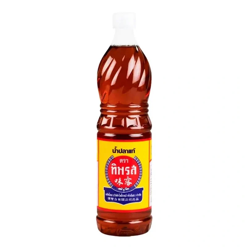 Tiparos Fish Sauce 700ml bottle, Asian dry grocery condiment with a clear glass container and a red and white label.