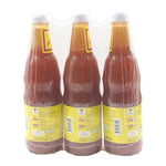 Golden Mountain Chili Sauce in three 680g bottles, rich and flavorful dry grocery condiment for Asian cuisine.