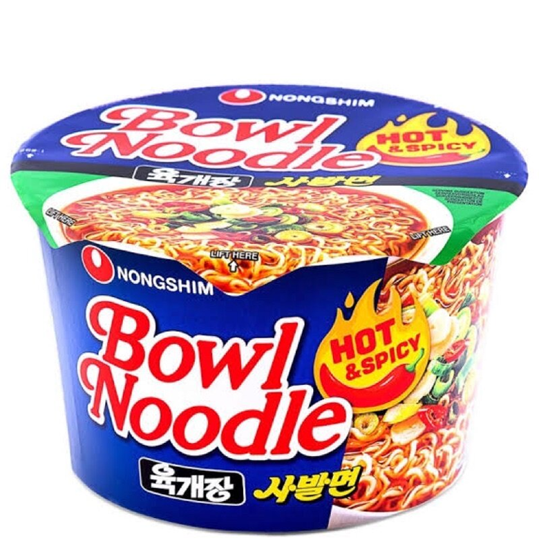 Nongshim Bowl Noodle Soup Hot & Spicy with noodles, broth, and vegetables in a disposable bowl.
