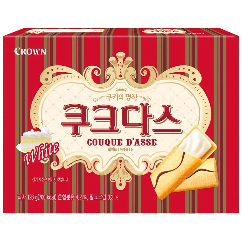 Crown Couque D’Asse White Torte 128g, a crispy snack confectionery with a golden-brown surface and detailed pattern.