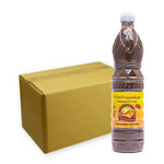 Pa-thong Patong fermented fish sauce 750ml bottle, traditional dry grocery condiment, showing the dark liquid inside the bottle