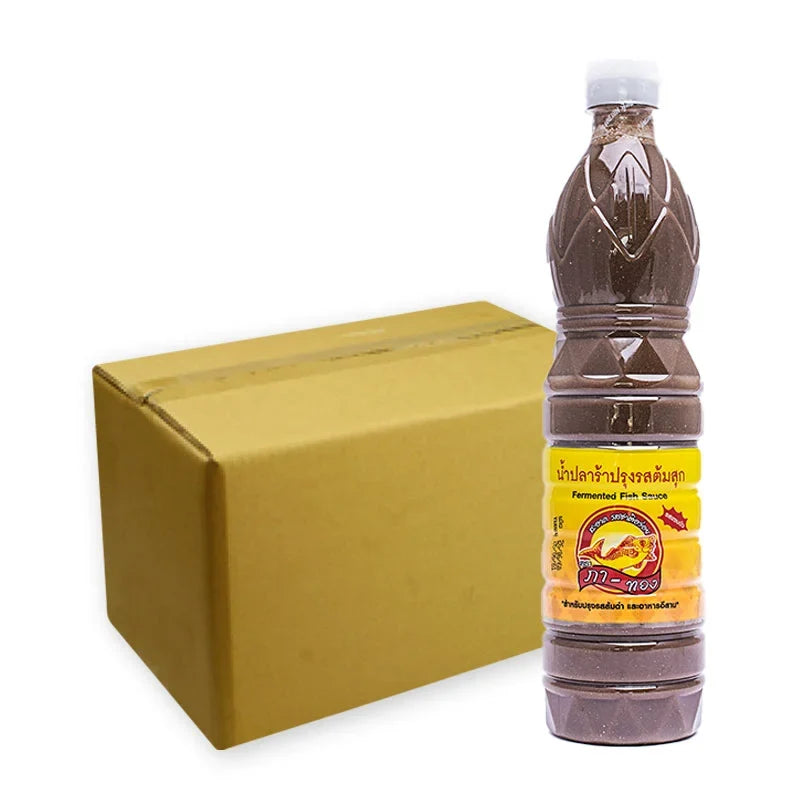 Pa-thong Patong fermented fish sauce 750ml bottle, traditional dry grocery condiment, showing the dark liquid inside the bottle