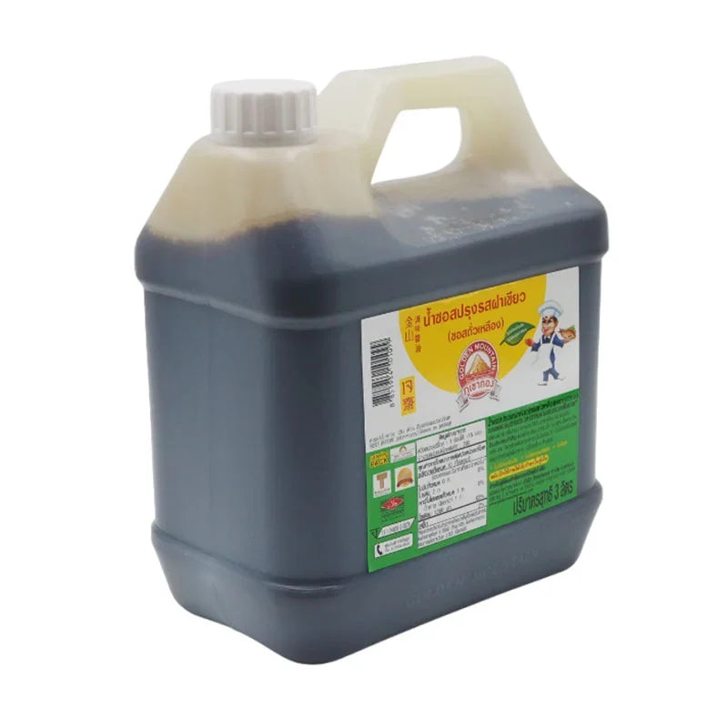 Golden Mountain seasoning sauce with green cap, 3L bottle, used for enhancing Asian dishes in dry grocery cooking.