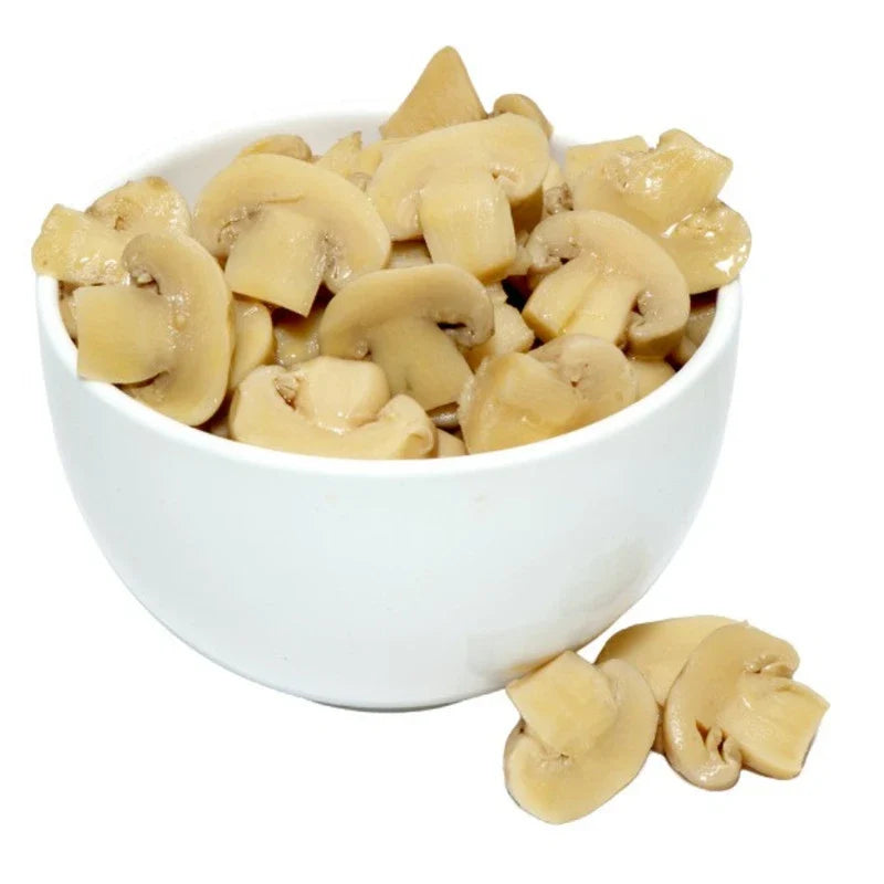 Sliced champignon mushrooms in brine from MICA, 400g jar, showcasing glossy mushroom slices in clear brine.