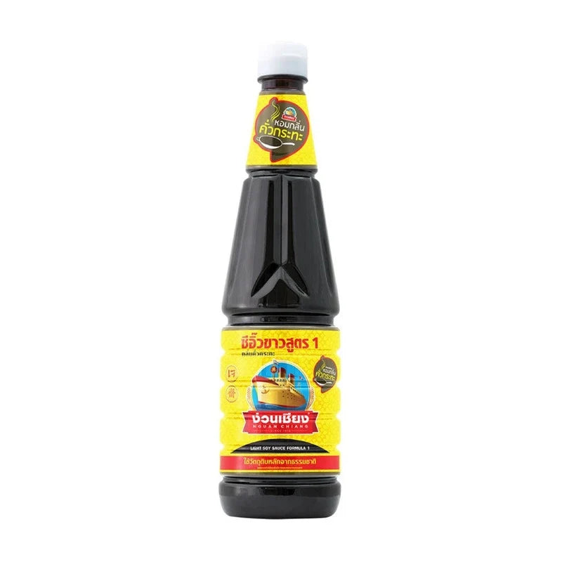 Bottle of Nguan Chiang Light Soy Sauce Formula 1 Natural Smoke, 700ml, in clear packaging for dry grocery use.