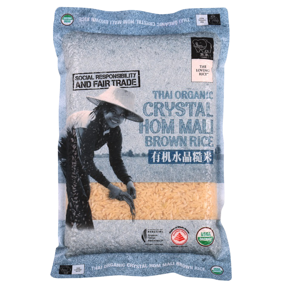 Chang Thai Organic Crystal Hom Mali Brown Rice in a clear bag, showcasing the light brown, long-grain rice from the Chang grocery brand.
