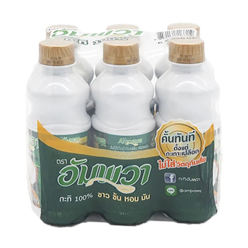 Ampawa Coconut Milk Pet 250ml bottles, six-pack, creamy Thai coconut milk for cooking and beverages.