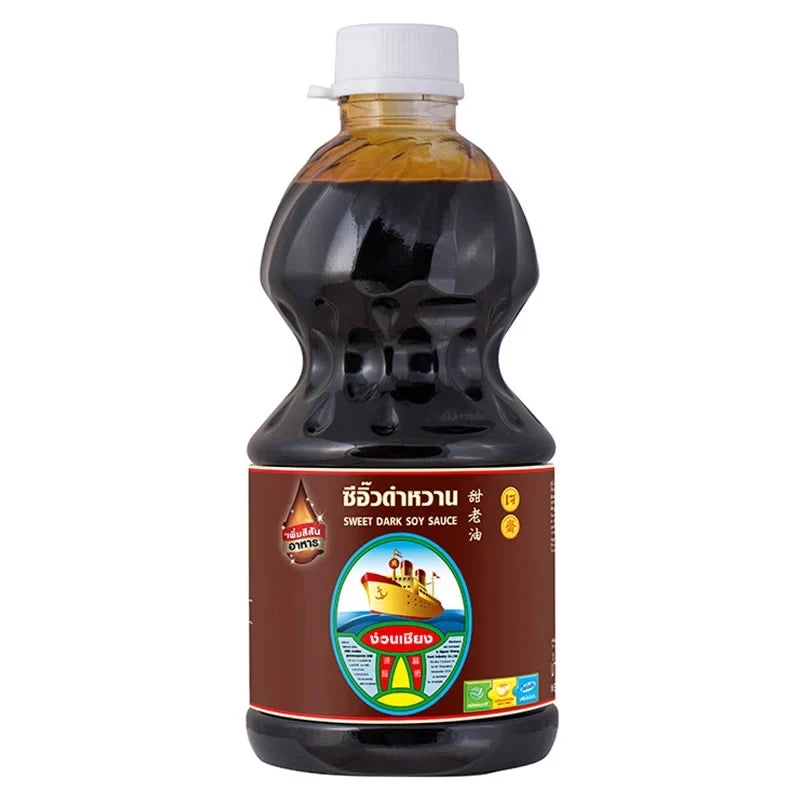 NGUAN CHIANG Sweet Dark Soy Sauce 2.7kg bottle for cooking, showcasing the dark, rich liquid in a clear container.