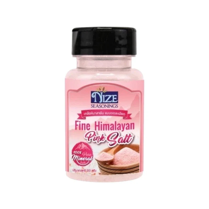 Finely ground Himalayan pink salt from NIZE, showcasing pink crystals in a clear container, ideal for culinary use.