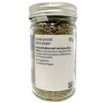 Sainsbury's coarse ground black pepper in a clear glass jar with black lid, labeled for grocery seasoning.