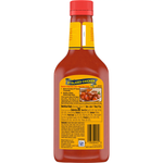 Heinz 57 Sauce bottle from grocery aisle, showing the classic label and red cap, used for flavorful meat and vegetable dishes.
