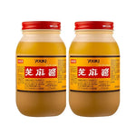 Two bottles of YOUKI Jima Jang White Roasted Sesame Paste, 800g each, in clear bottles showing the creamy sesame paste inside.