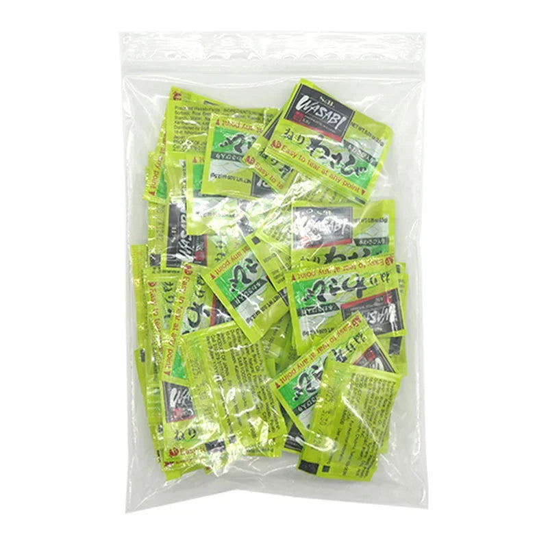 S&B Wasabi mini 2.5g sachets, dry grocery product, with 50 individual wasabi condiment packets on a white background.
